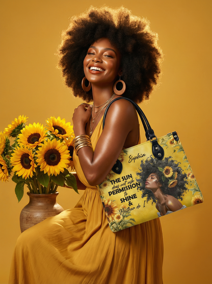 Woman holding a Melaniva Sunlit Crown Leather with sunflower design and text against a yellow background
