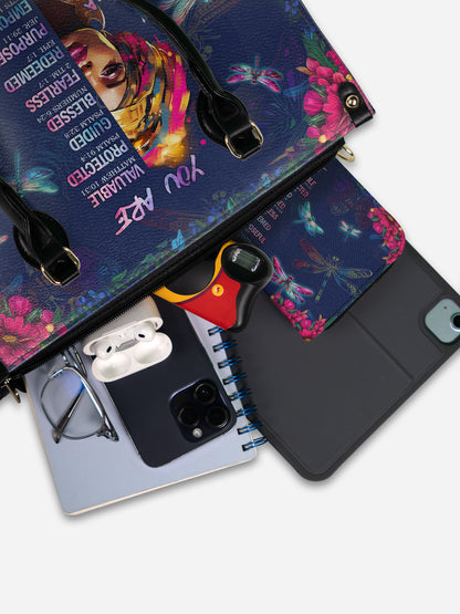 Melaniva “Divine Identity” Leather Handbag Deal